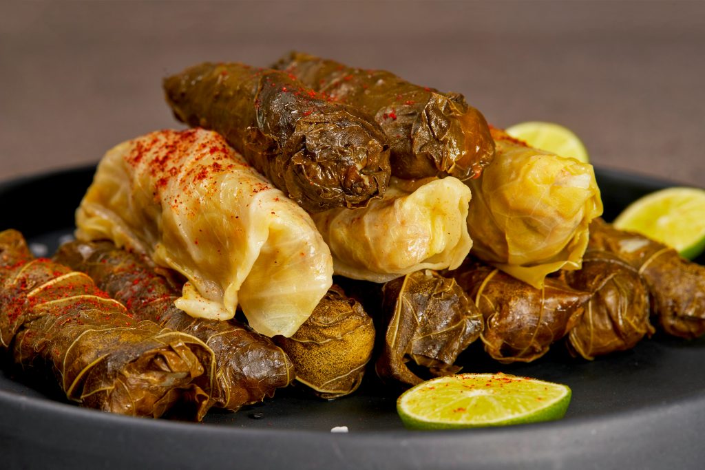 Arabic cuisine, stuffed grape leaves or cabbage rolls, rice and minced meat stuffed