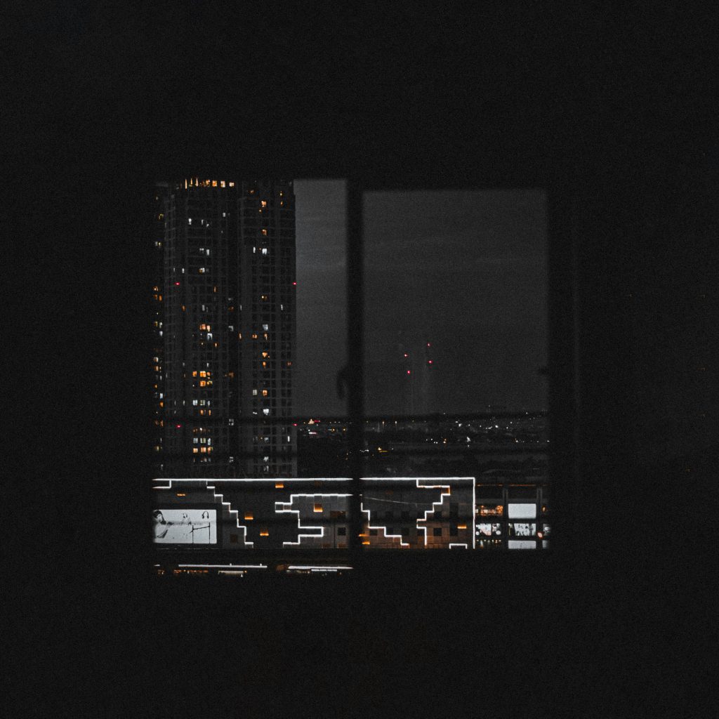 empty apartment city window night urban loneliness