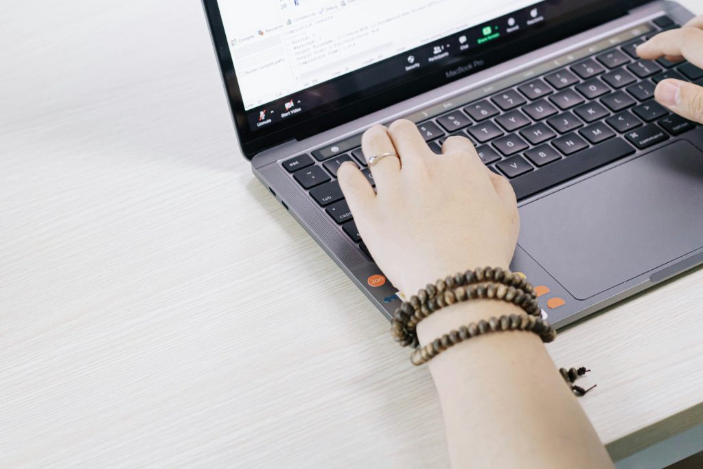 seo writer working laptop content strategy keywords