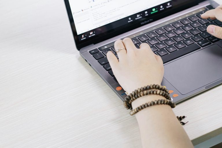 seo writer working laptop content strategy keywords