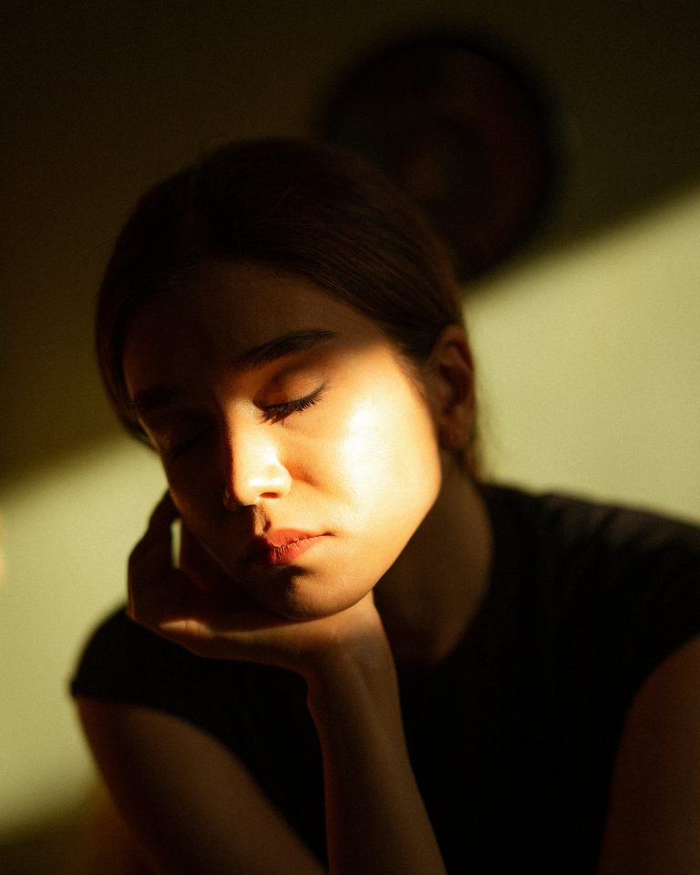 person quiet emotional moment warm intimate light human connection