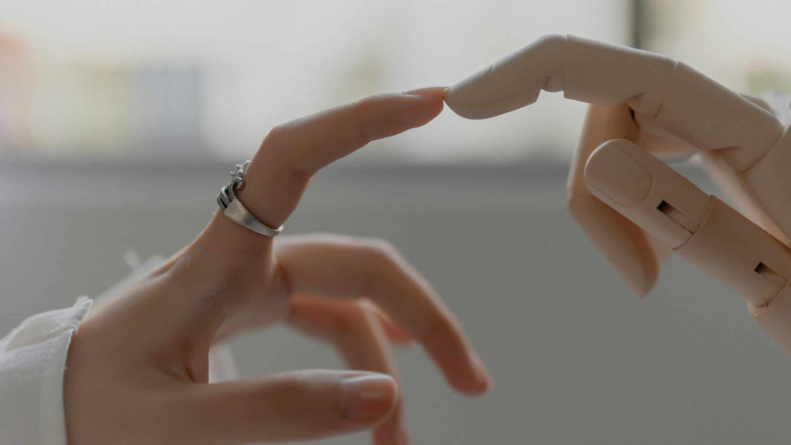 human hand robot hand touch almost