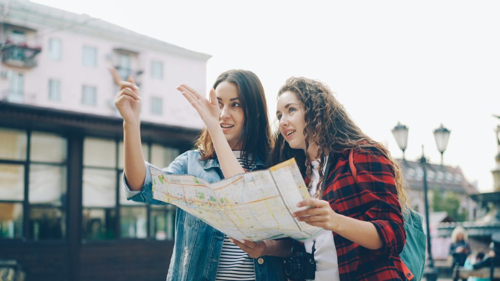 tourist map with local person pointing direction friendly