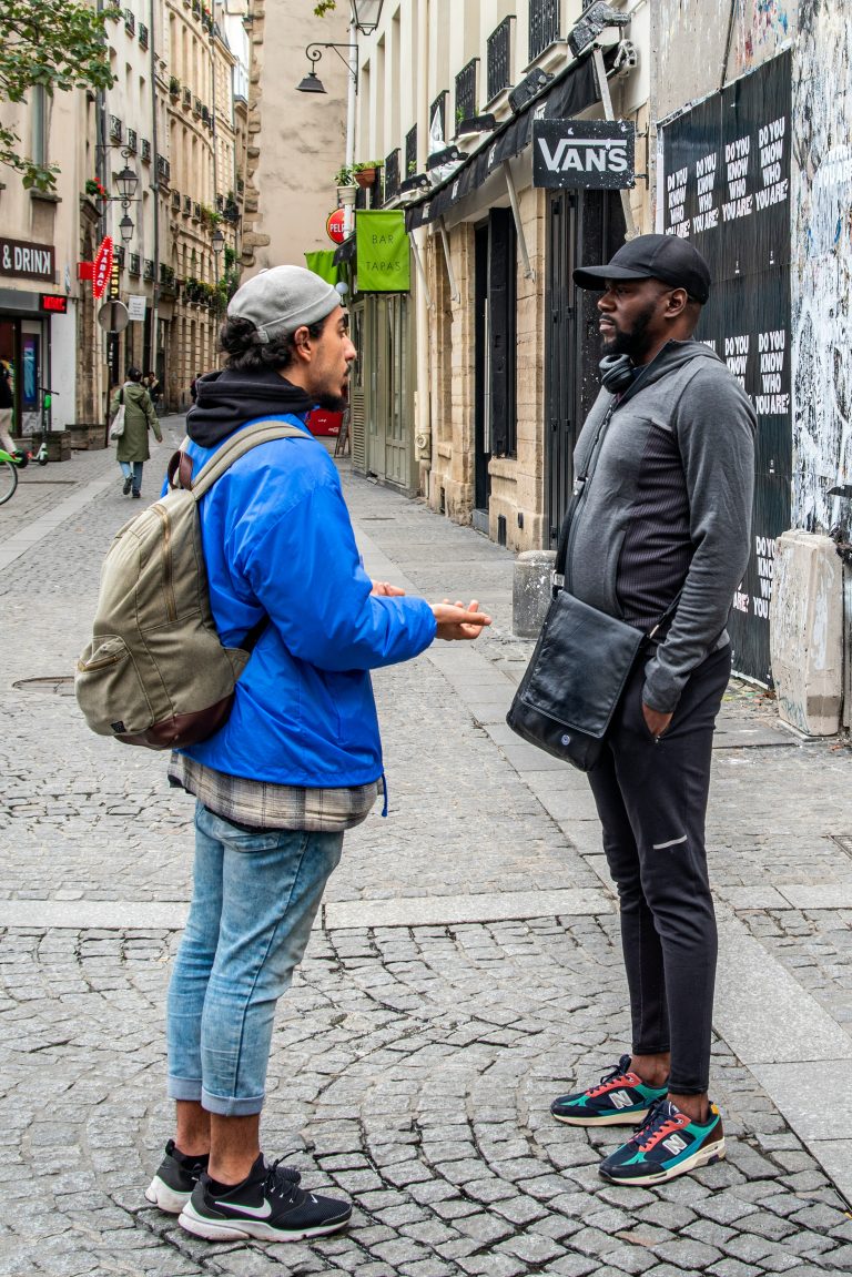 traveler talking to local market conversation smile