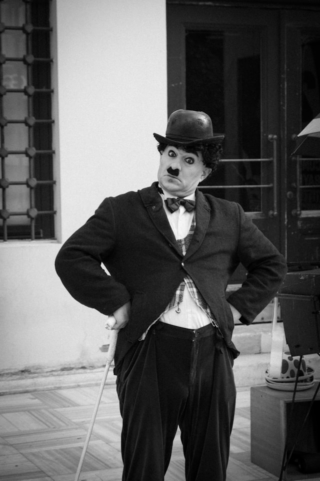 A person imitating the classic Charlie Chaplin character