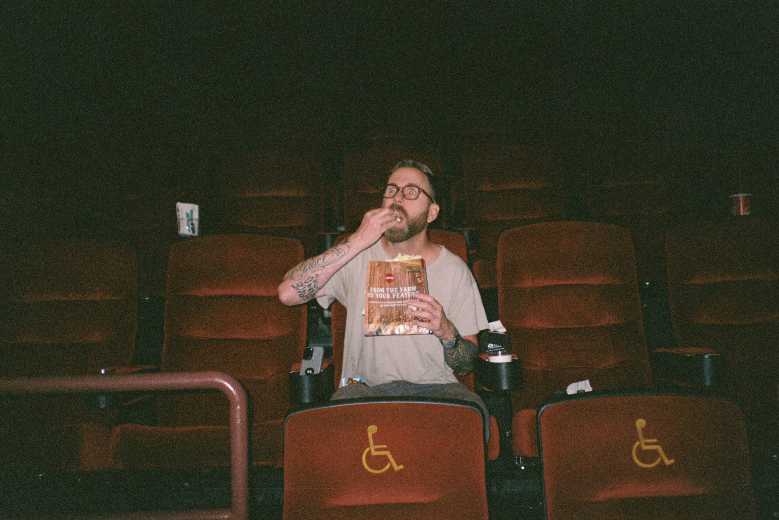 cinema empty seats dark popcorn