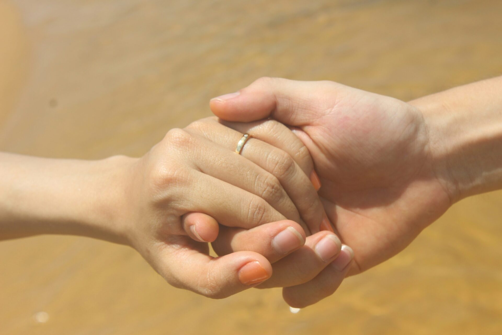 couple hands together calm peaceful