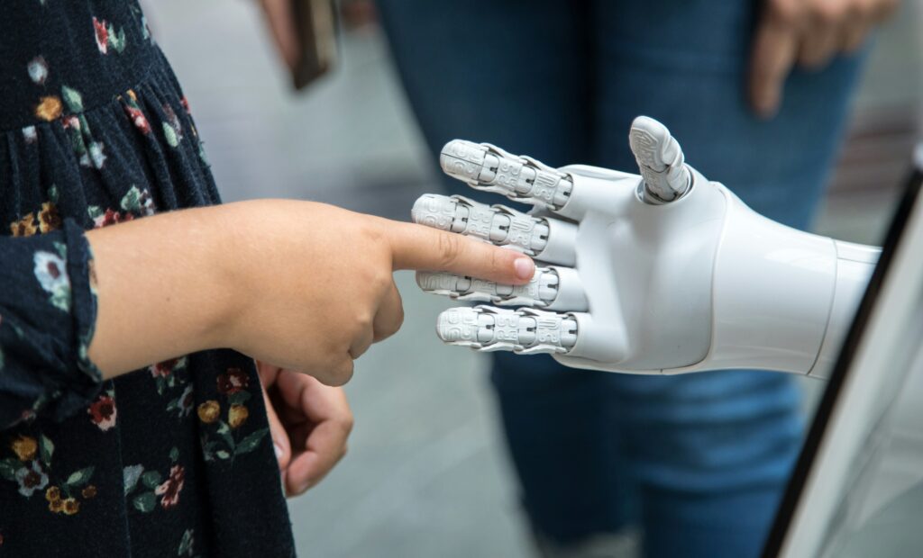 human hand reaching robot hand connection