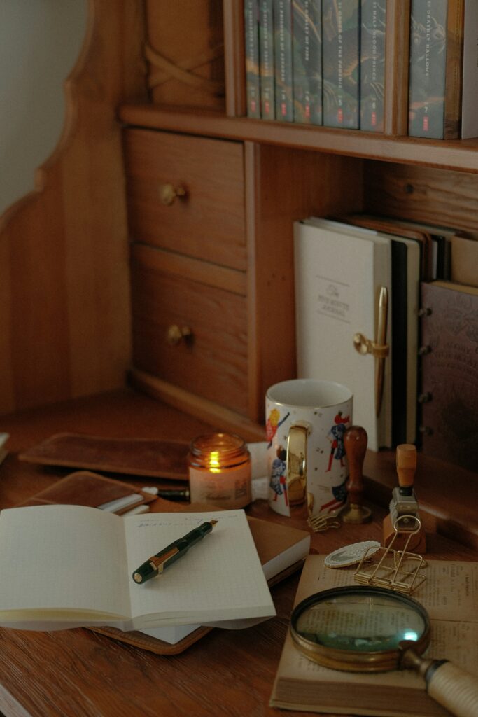 open book tea cup wooden desk quiet morning