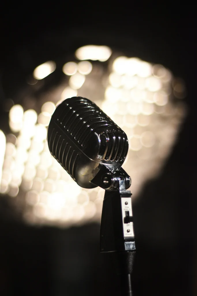 vintage microphone stage curtains spotlight