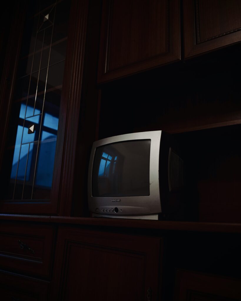 vintage tv screen glow dark room nostalgia
