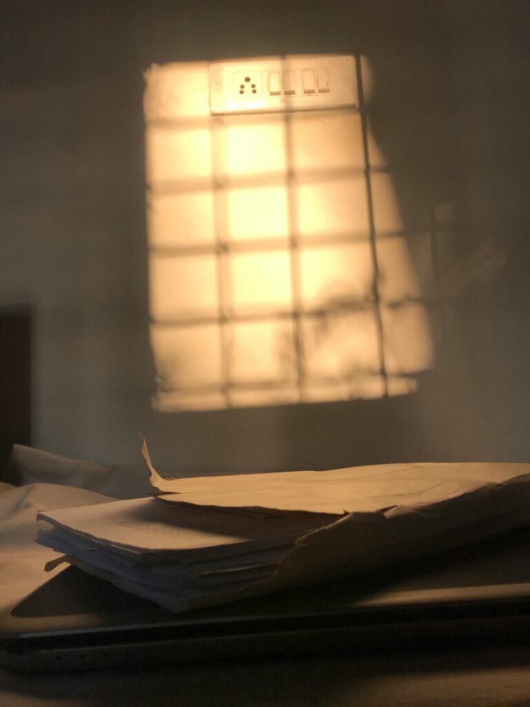 writer cell manuscript smuggled paper prison literature