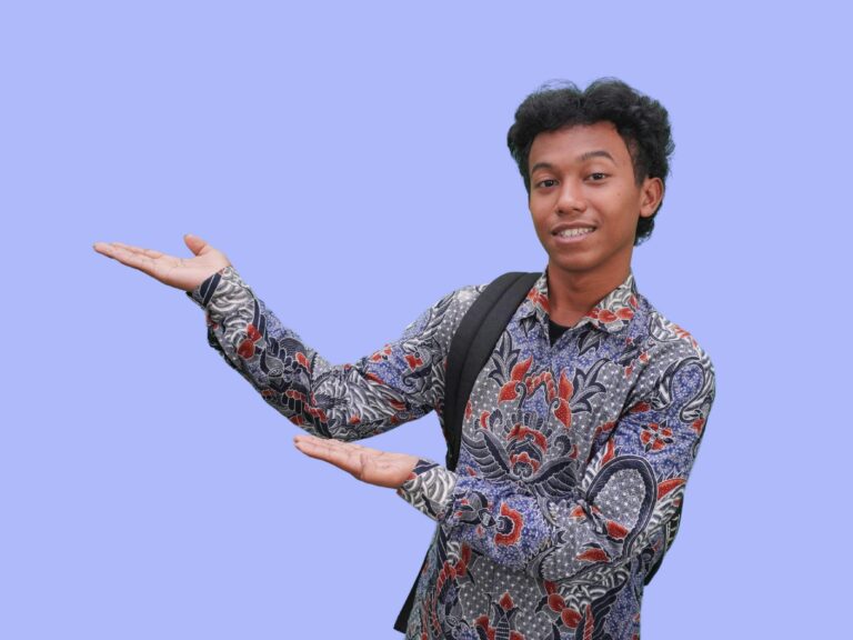 A friendly young Indonesian man invites you in