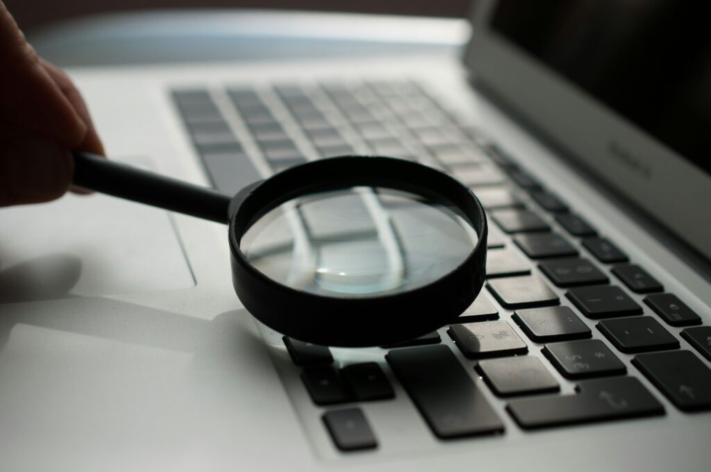 AI search results screen magnifying glass digital