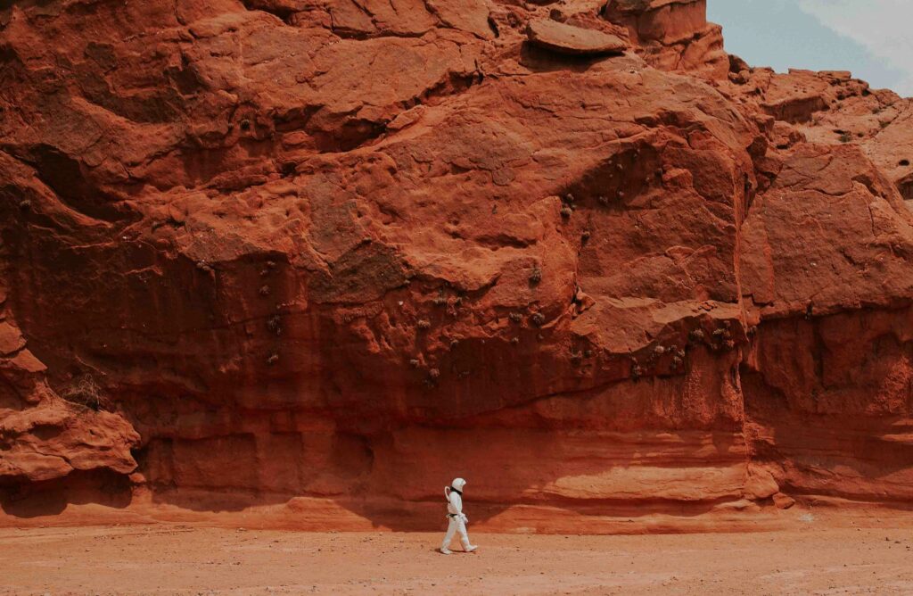 An astronaut roams Mars