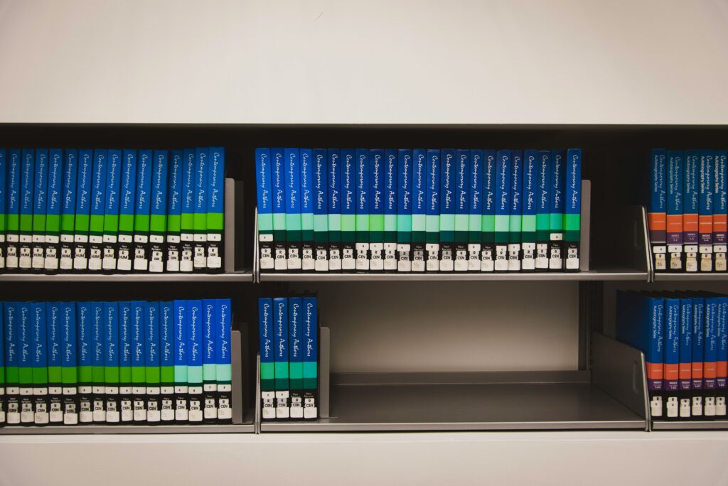 organized library bookshelves labeled folders