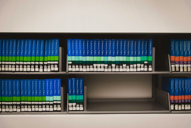 organized library bookshelves labeled folders