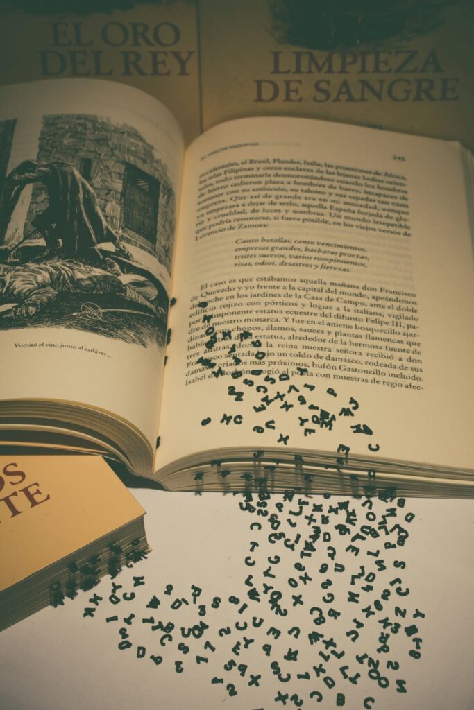 letters coming out of the book